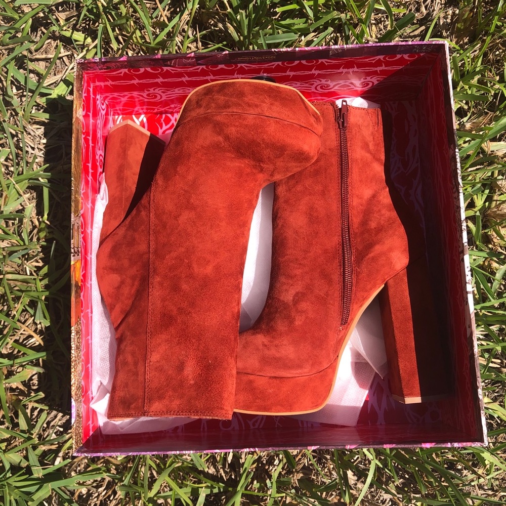 Rust Red heeled booties by Jeffrey Campbell